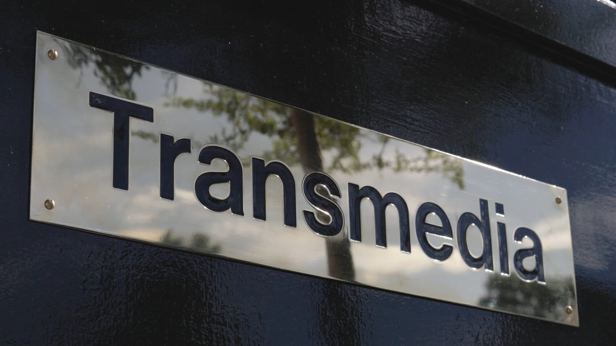 Transmedia House sign