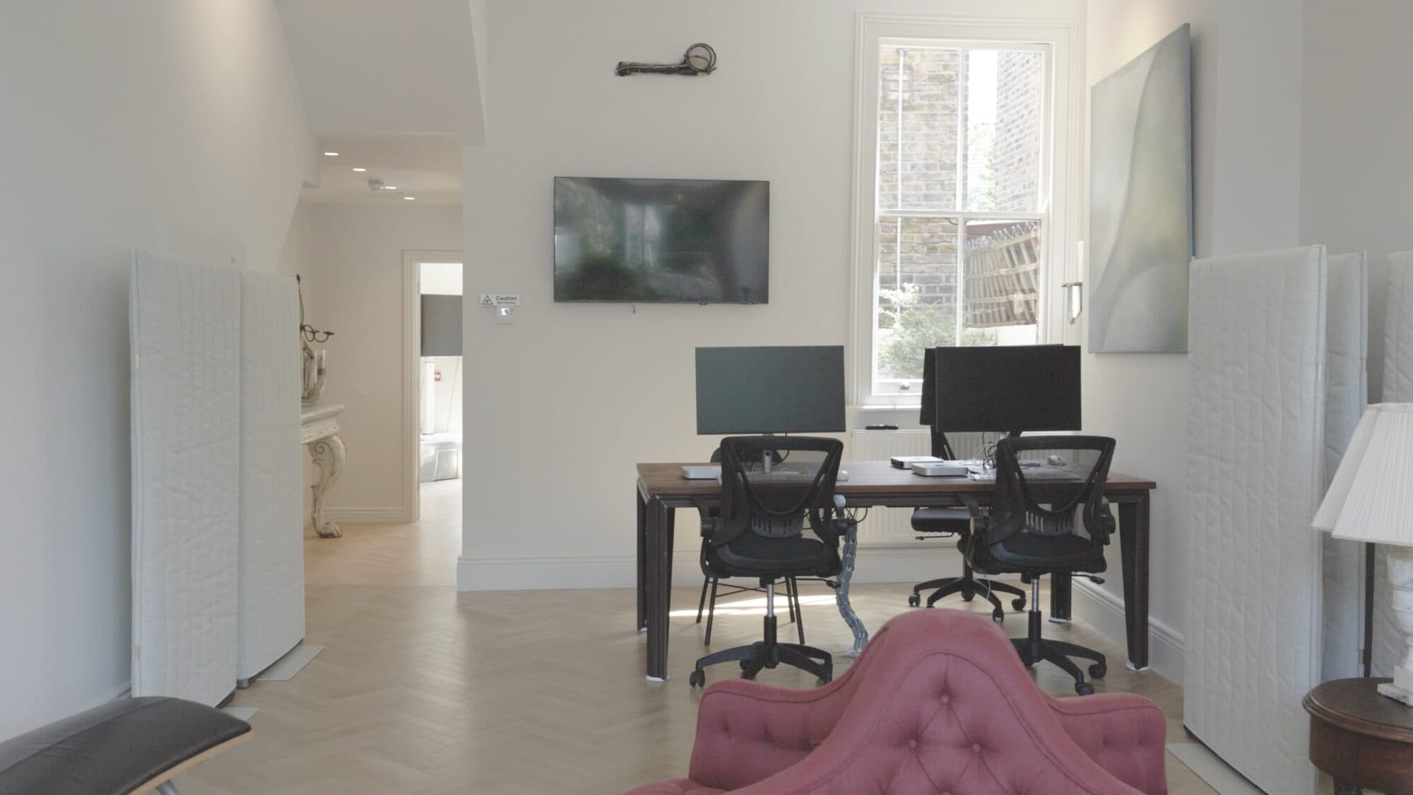 Front-of-house room with welcome desk and seating
